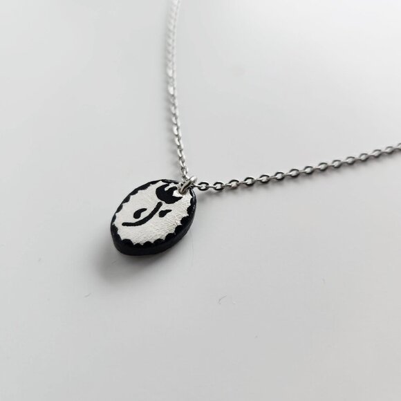 Dainty iridescent flower necklace with a small silver chain - Picture 6 of 8